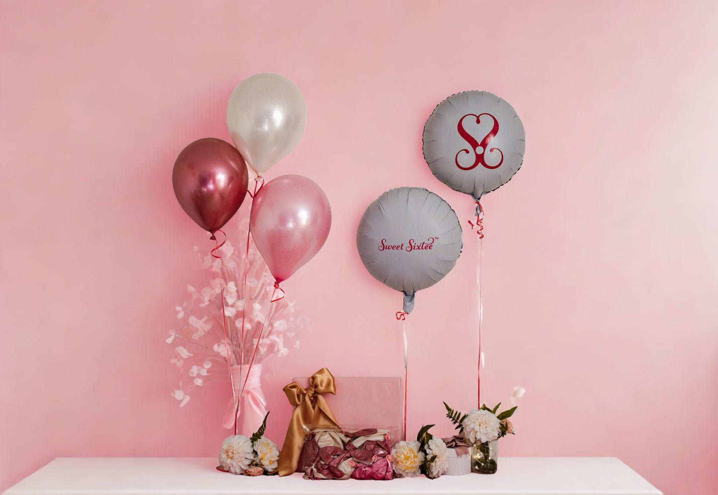 Decorative balloons with flowers on a pink background, sweet sixtee, balloon bouquet, 60th birthday party decor